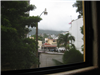  Pohled z našeho okna na hory obklopující město a zátoku. 
